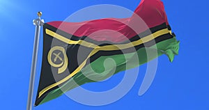 Flag of Vanuatu waving at wind in slow with blue sky, loop