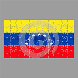 Flag of Venezuela from puzzles on a gray background.