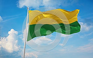 flag of Vichada , Colombia at cloudy sky background on sunset, panoramic view. Colombian travel and patriot concept. copy space photo