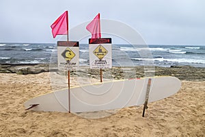 Coastal hazard signs high surf, storng curent Rescuse board, pin photo