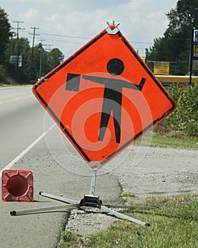 Flagman ahead caution