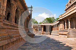 Flagpost and 100 pillar Maha-mandapa, Airavatesvara Temple, Darasuram, Tamil Nadu. Nataraja mandapa is seen at the end. View from
