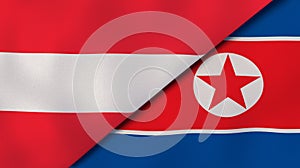 The flags of Austria and North Korea. News, reportage, business background. 3d illustration