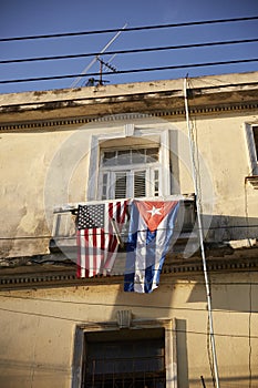 Flags on balcony of house in Cuba