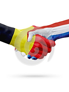 Flags Belgium, Netherlands countries, partnership friendship handshake concept.