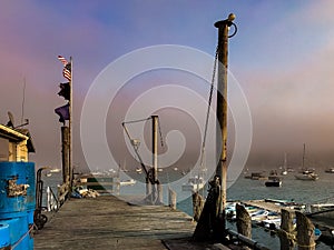 Flags, Boats and Fog on the Maine Harbor