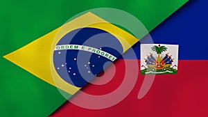 The flags of Brazil and Haiti. News, reportage, business background. 3d illustration