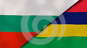 The flags of Bulgaria and Mauritius. News, reportage, business background. 3d illustration