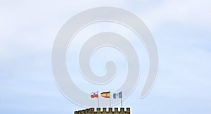 Flags at the castle of San Vicente de la Barquera, Cantabria