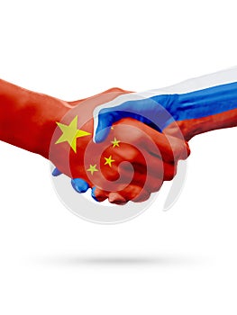 Flags China, Russia countries, partnership friendship handshake concept.