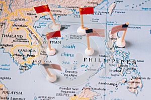 flags of china and the united states on a map of the south china sea. Concept of the south china sea diplomatic conflict