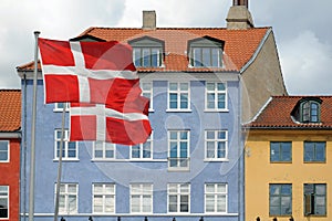 Flags and colored houses in Copenhagen, Denmark