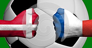 Flags of Denmark and France painted on two clenched fists facing each other with closeup 3d soccer ball in the background/Soccer m