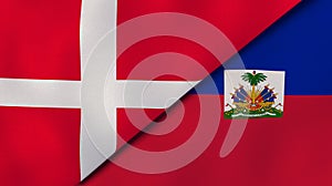 The flags of Denmark and Haiti. News, reportage, business background. 3d illustration