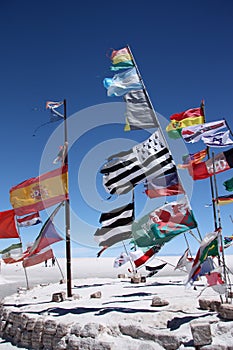 Flags in desert of Salar de Uyuni