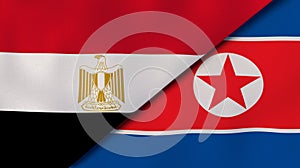 The flags of Egypt and North Korea. News, reportage, business background. 3d illustration