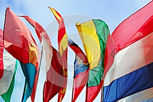 Flags of Europe states against cloudy sky