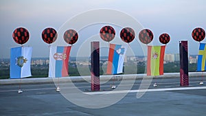 Flags of European countries in a row on the roof opening ceremony Eurovision