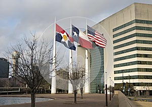 Flags flying in front of Dallas City Hall, seat of municipal government