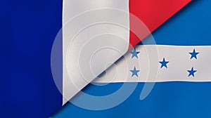 The flags of France and Honduras. News, reportage, business background. 3d illustration