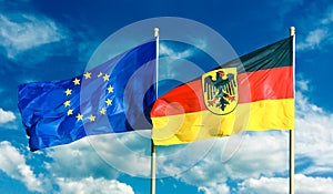 Flags of Germany Federal Republic of Germany; in German: Bundesrepublik Deutschland and European Union EU waving