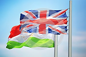 Flags of Great Britain and Tajikistan