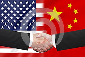 Flags of half USA with half china with business handshake