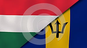 The flags of Hungary and Barbados. News, reportage, business background. 3d illustration