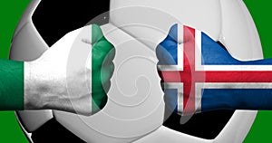 Flags of Iceland and Nigeria painted on two clenched fists facing each other with closeup 3d soccer ball in the background/Soccer