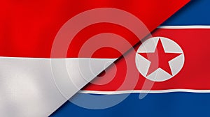 The flags of Indonesia and North Korea. News, reportage, business background. 3d illustration