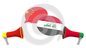 Flags of Iraq and China on speech balloons from megaphones. Intercultural dialogue or international talks related 3D