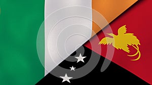 The flags of Ireland and Papua New Guinea. News, reportage, business background. 3d illustration