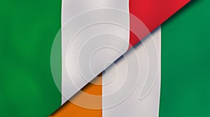The flags of Italy and Ivory Coast. News, reportage, business background. 3d illustration