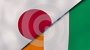 The flags of Japan and Ivory Coast. News, reportage, business background. 3d illustration