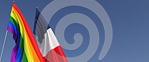 Flags of LGBT and France on flagpole on a blue background on the side. Rainbow flag. Place for text. Paris. LGBT community. 3d