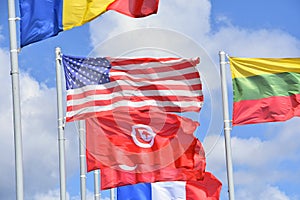 Flags of many countries, blue sky background