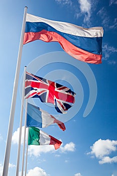 Flags of many nations the world waving