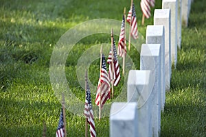 Flags of Memorial Day before tombstones at Arlington National Cemetery