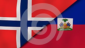 The flags of Norway and Haiti. News, reportage, business background. 3d illustration