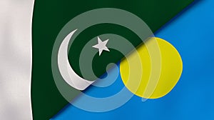 The flags of Pakistan and Palau. News, reportage, business background. 3d illustration