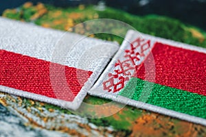 Flags of Poland and Belarus. The concept of mutual relations and border problems of both countries