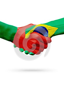 Flags Portugal, Brazil countries, partnership friendship handshake concept.