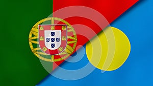 The flags of Portugal and Palau. News, reportage, business background. 3d illustration