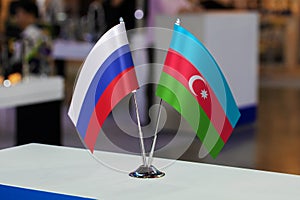 Flags of Russia and Azerbaijan together at some event or fair. Flags of the two countries as a symbol of cooperation