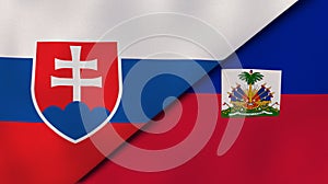 The flags of Slovakia and Haiti. News, reportage, business background. 3d illustration