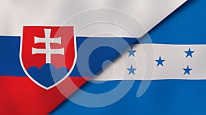 The flags of Slovakia and Honduras. News, reportage, business background. 3d illustration