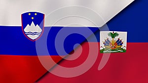 The flags of Slovenia and Haiti. News, reportage, business background. 3d illustration