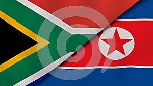The flags of South Africa and North Korea. News, reportage, business background. 3d illustration