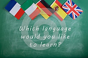 flags of Spain, France, Great Britain, Russia and Italy and blackboard with text "Which language would you like to learn