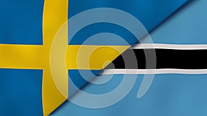 The flags of Sweden and Botswana. News, reportage, business background. 3d illustration